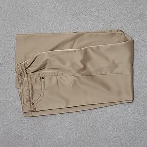 Tan long pants with an elastic side back and 4 pockets.